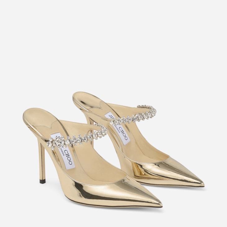 Gold coloured Jimmy Choo high heel wedding shoes Stock Photo - Alamy