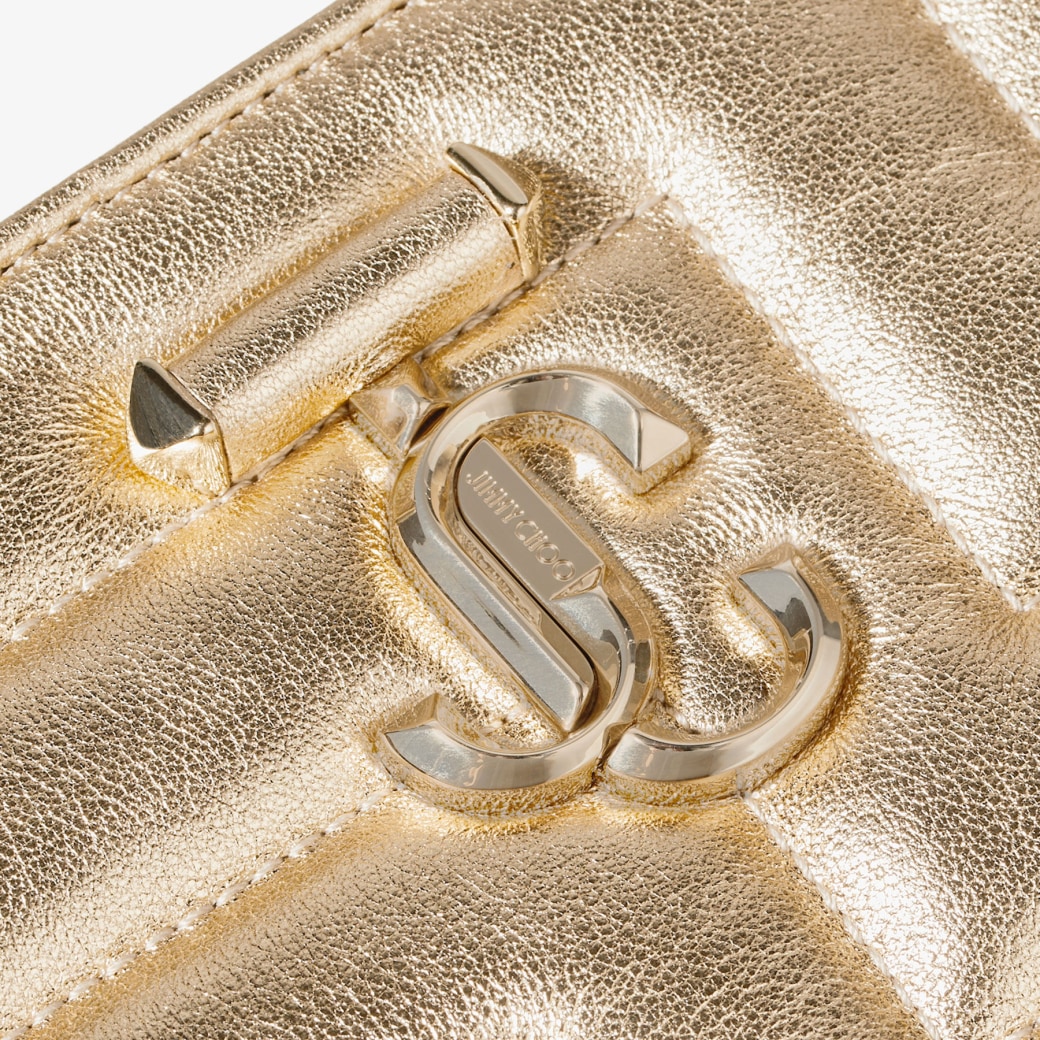 Gold jimmy sales choo bag