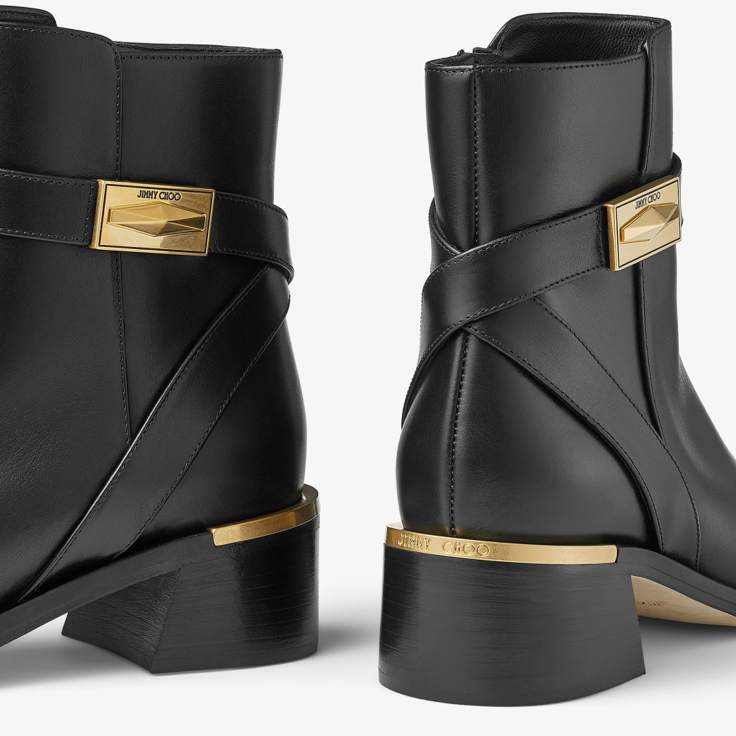Gold jimmy choo boots top