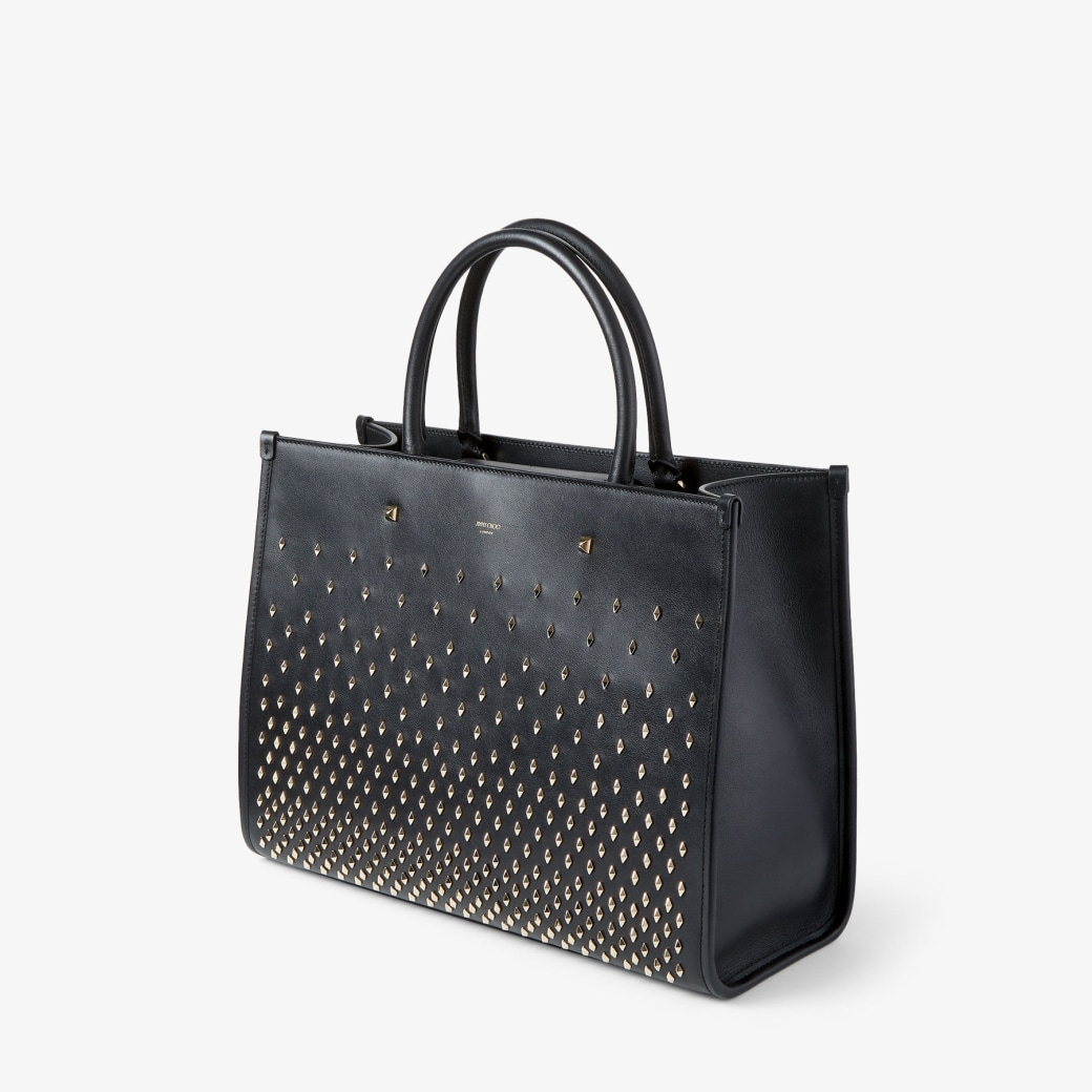 Studded black tote bag store