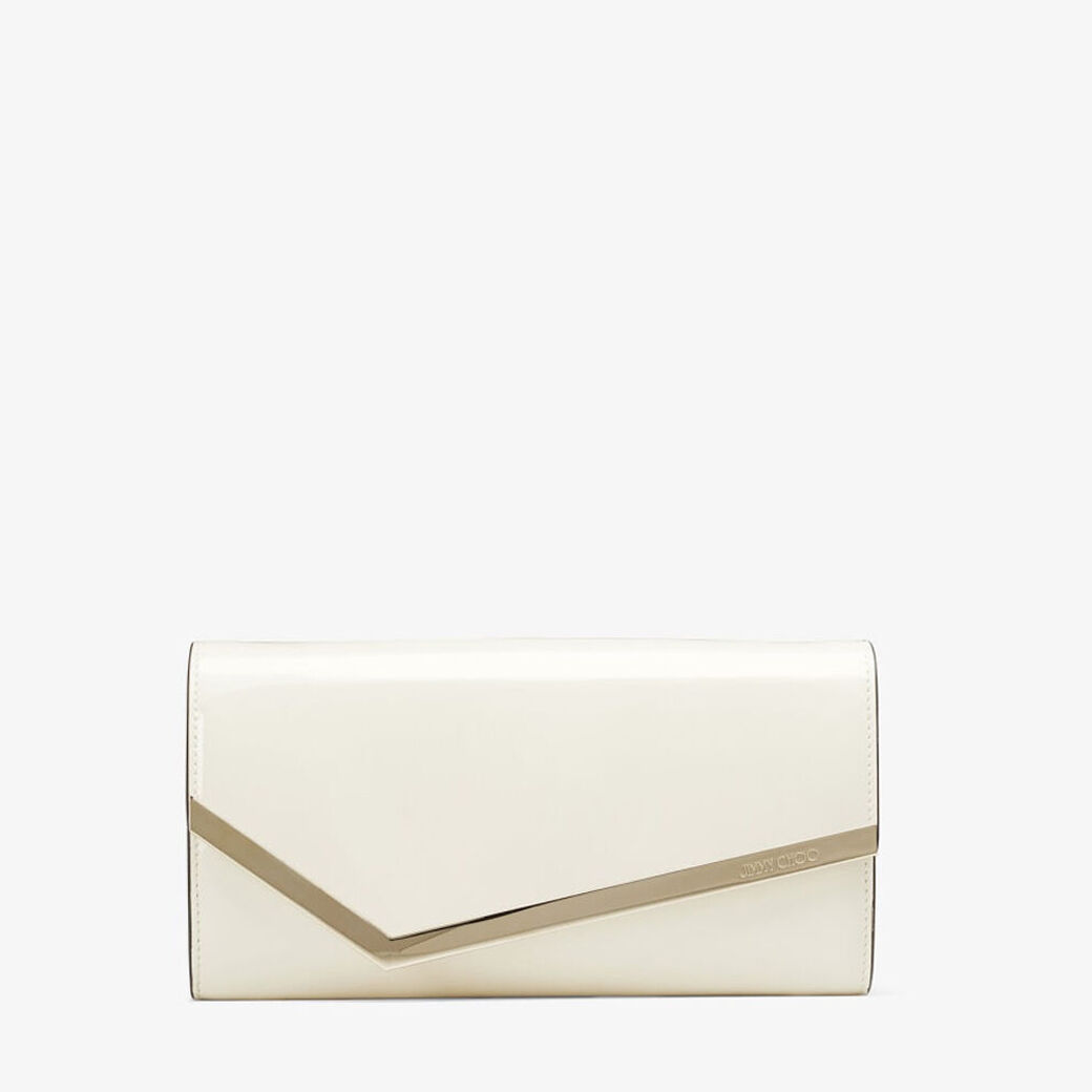 Cream patent shop clutch bag