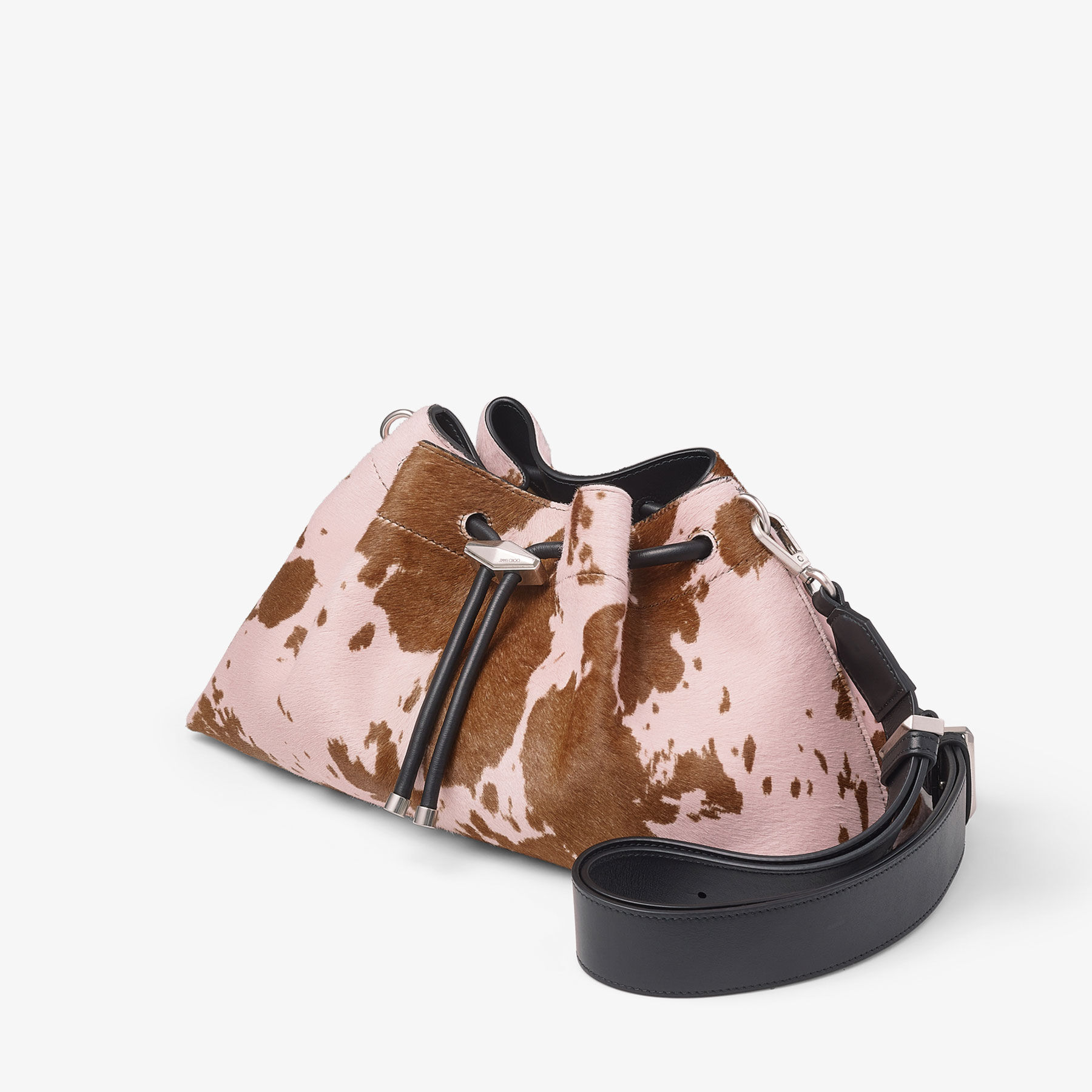 Cow print clutch bag top