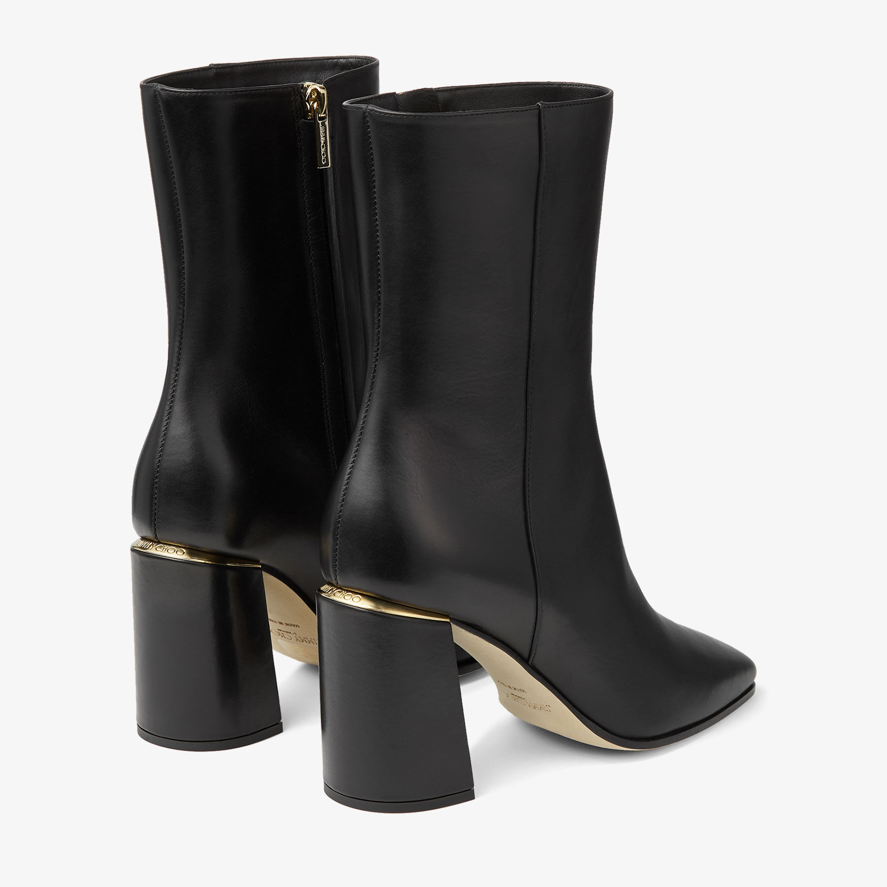 Black ankle boots with metal detail sales