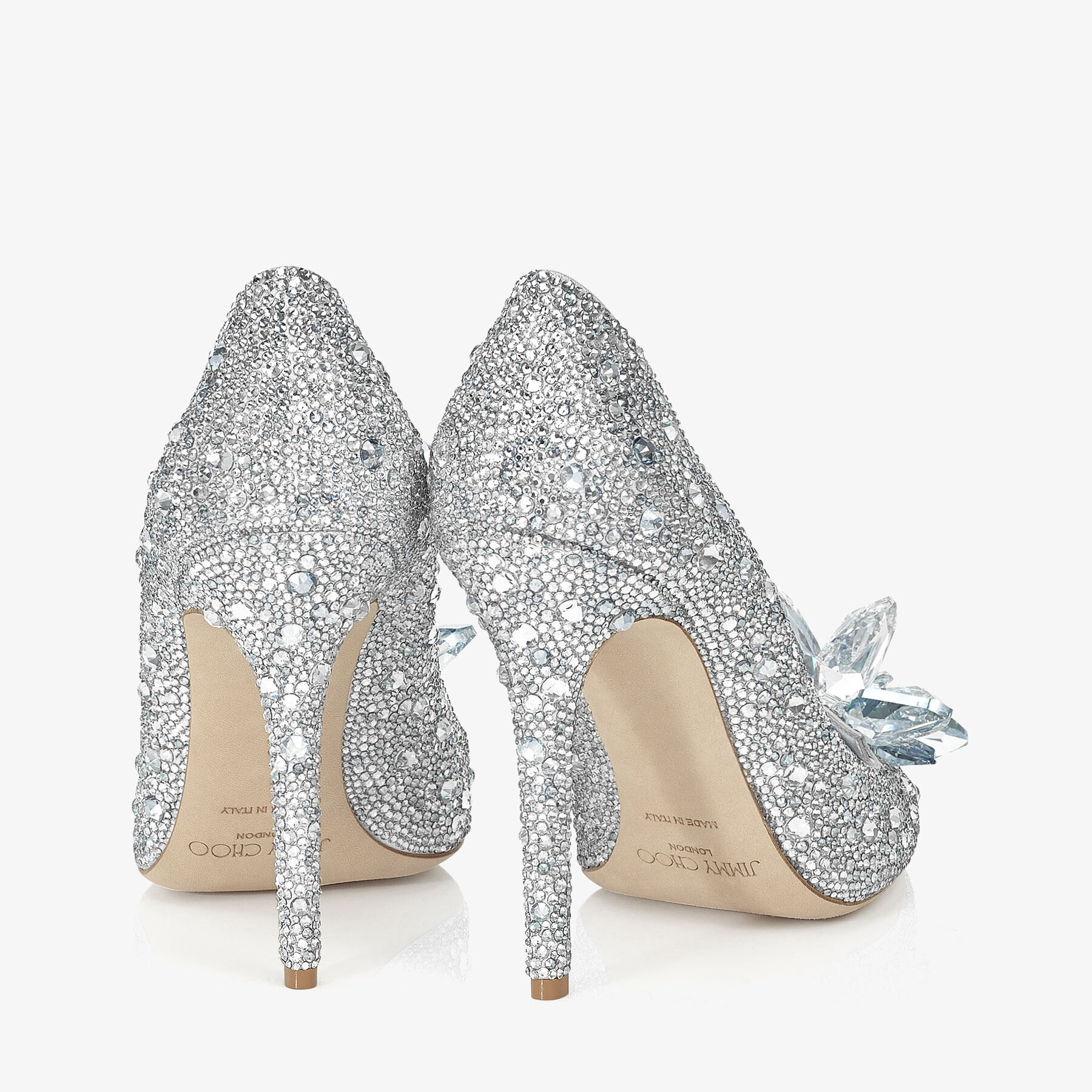 JIMMY CHOO - Glamorous and sophisticated, the AVRIL Cinderella pumps  capture the true essence of Jimmy Choo in all their crystal-covered  perfection. Discover the Cinderella collection at
