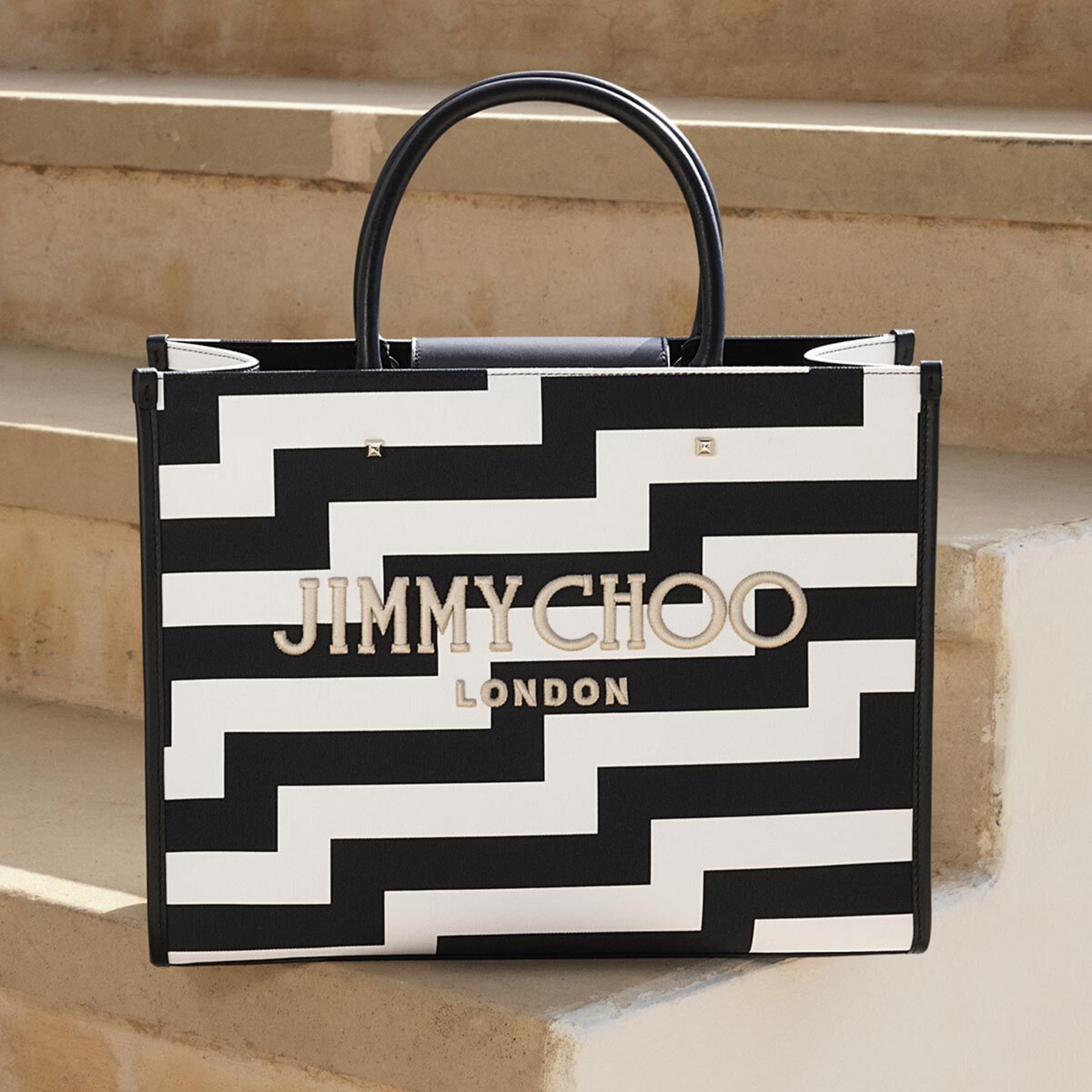 Jimmy choo shopping hot sale bag