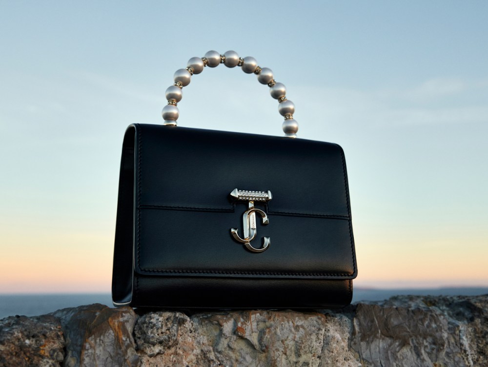 Black Xandra pearl-embellished satin clutch bag | Jimmy Choo | MATCHES UK