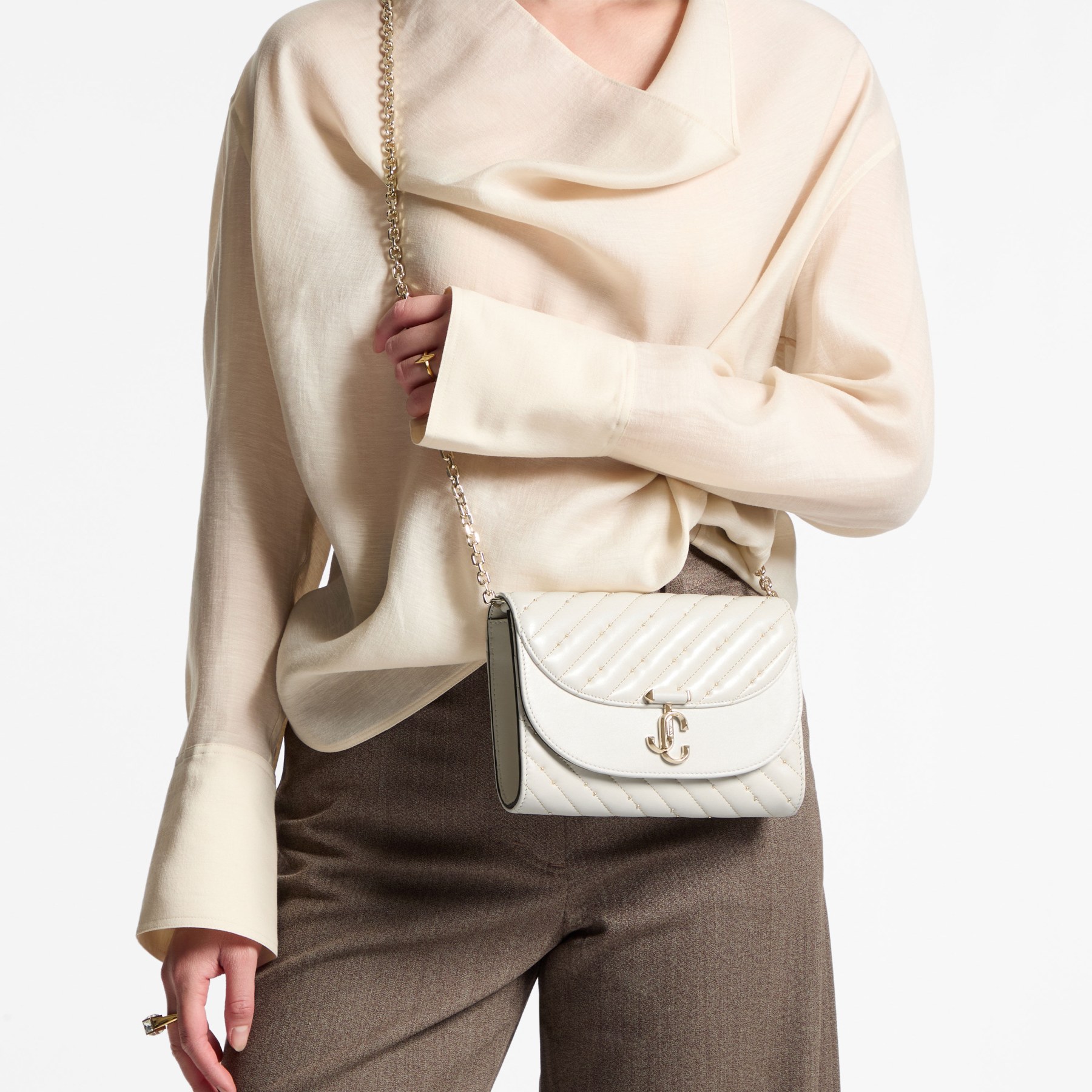 Avenue Curve Clutch | Latte Quilted Nappa Leather Clutch Bag Avenue Curve Clutch | Latte Quilted Nappa Leather Clutch Bag