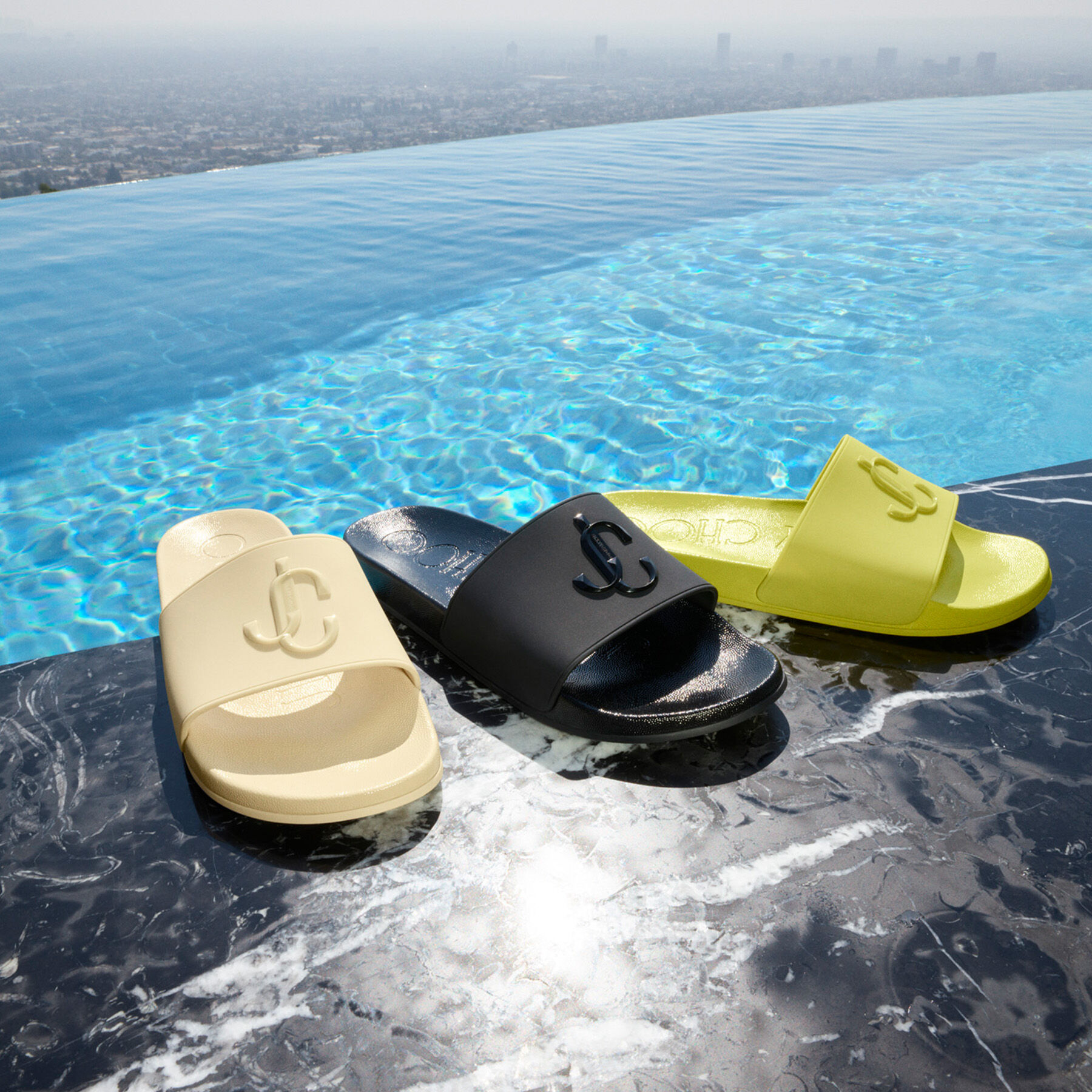 Black Rubber Slides with JC Monogram | PORT/M | Spring 2022