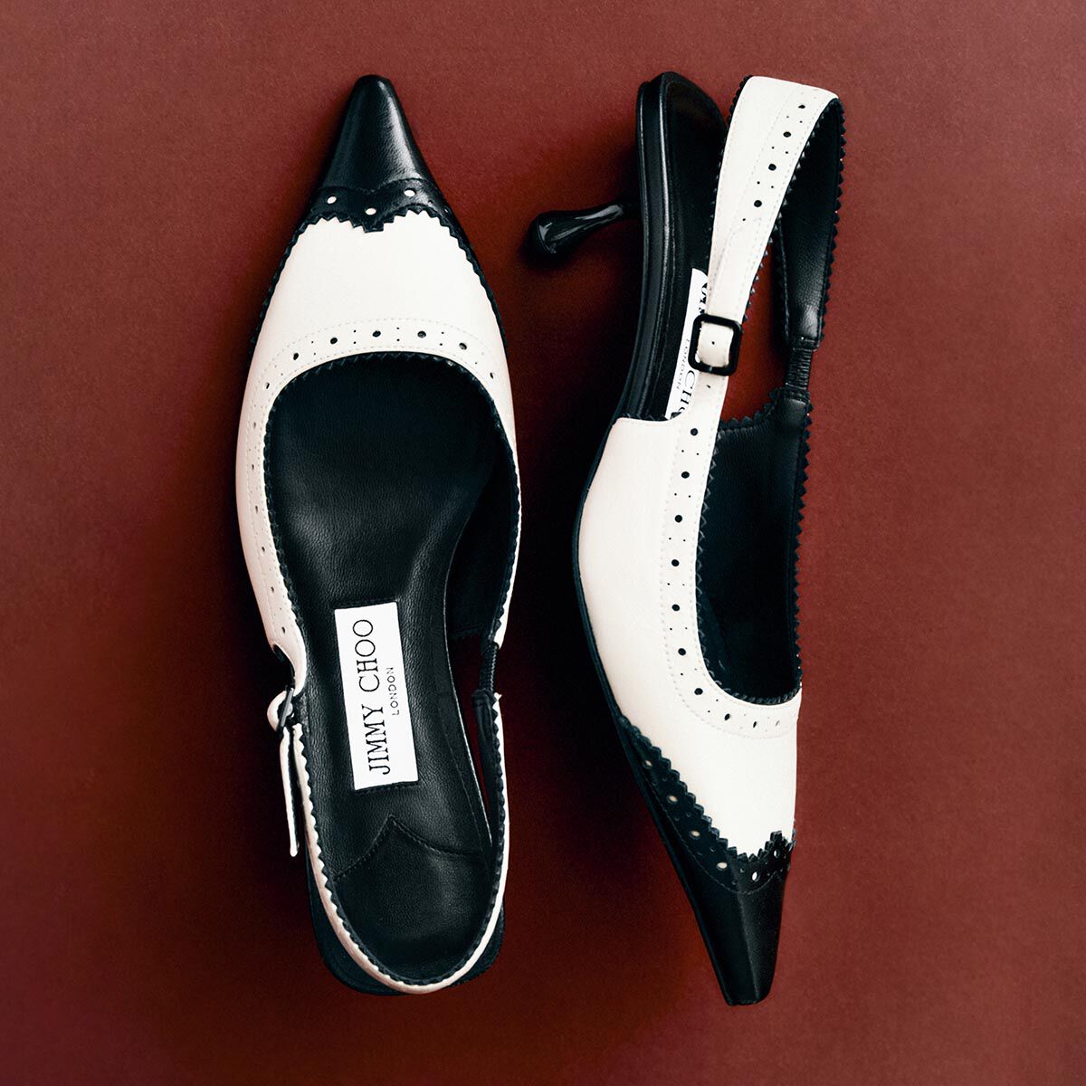 Amel 50 | Black and Bone Leather Slingbacks with Brogue Detailing
