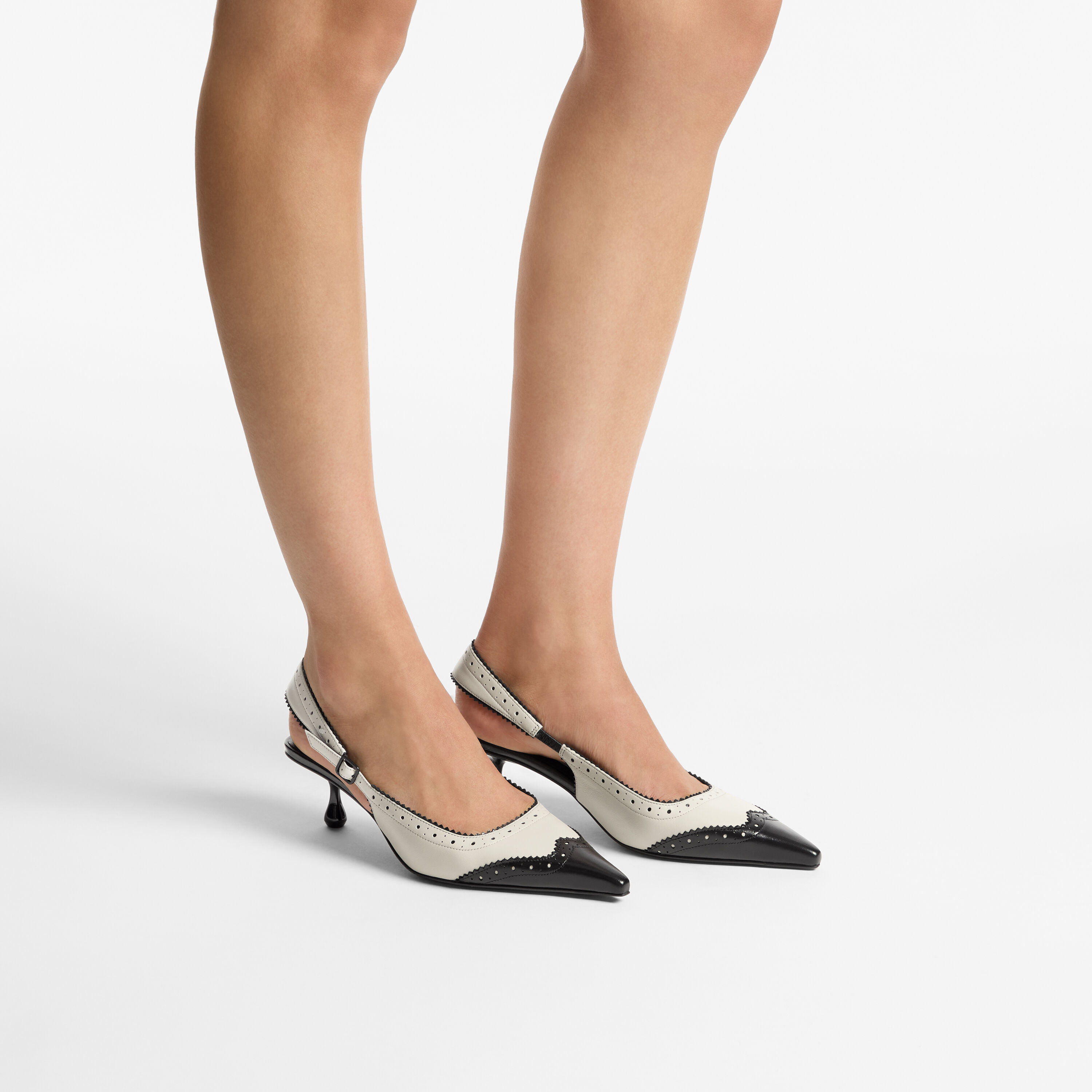 Amel 50 | Black and Bone Leather Slingbacks with Brogue Detailing