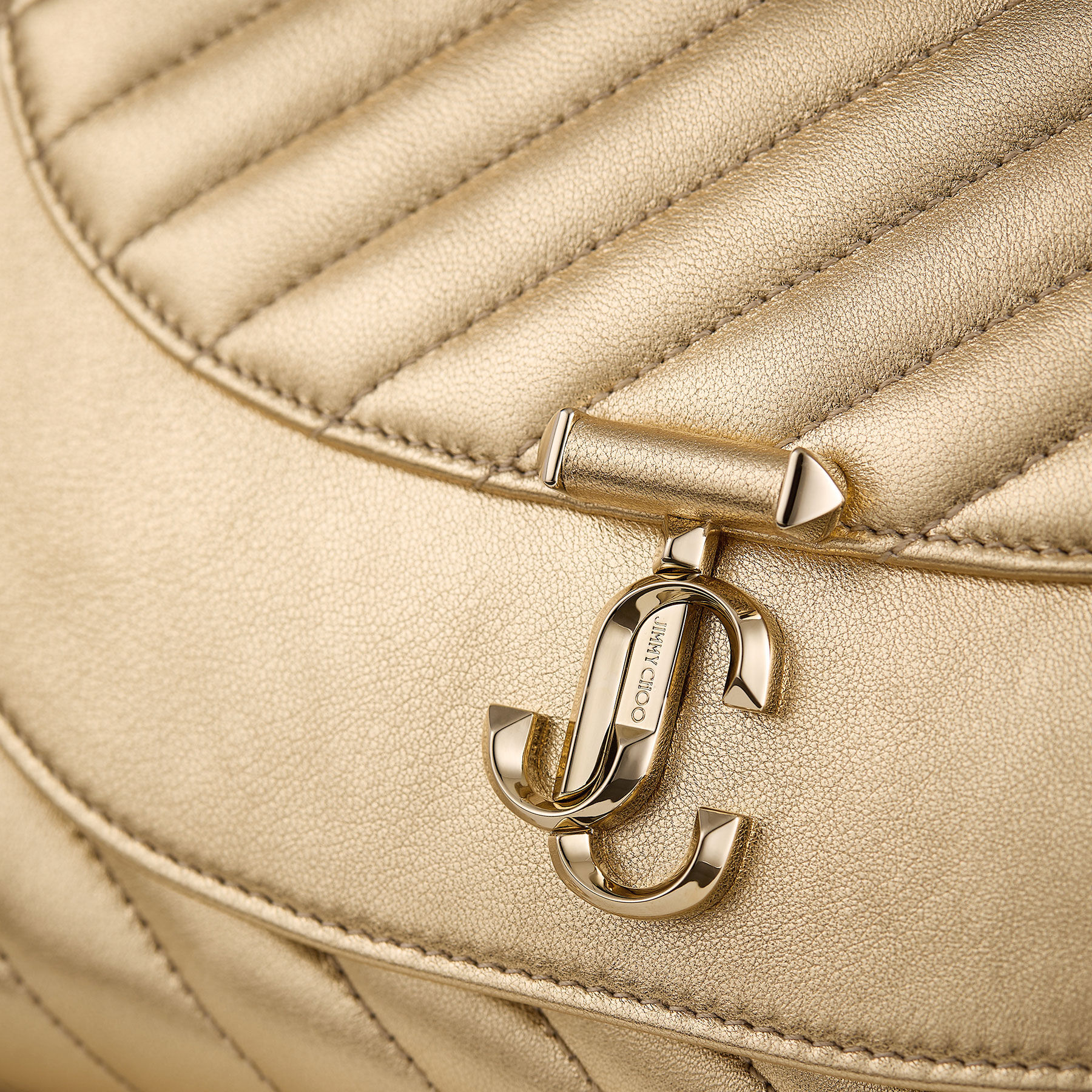 Curve Clutch | Shiny Gold Quilted Metallic Leather Clutch