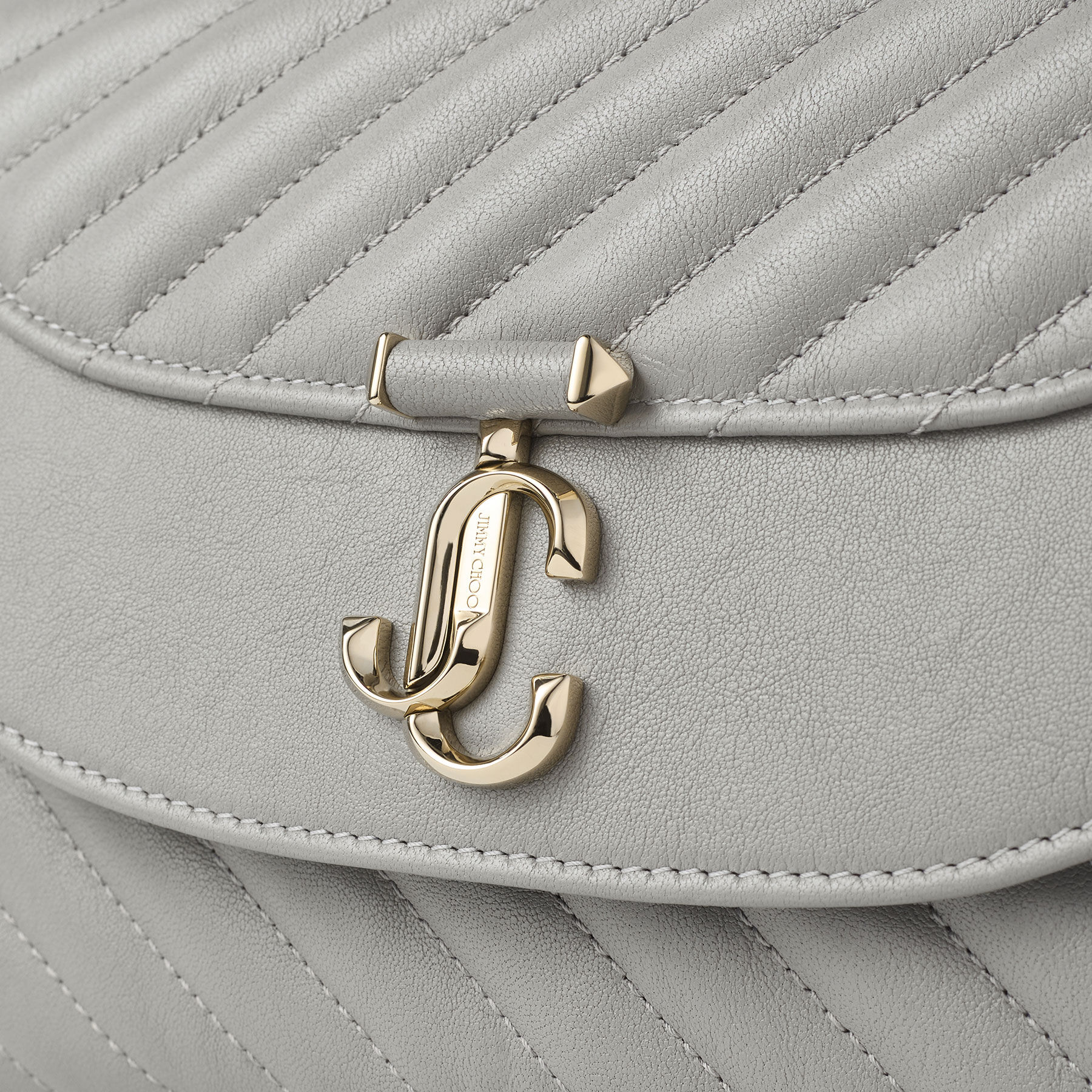 Curve Top Handle | Dove Quilted Biker Leather Top Handle Bag with