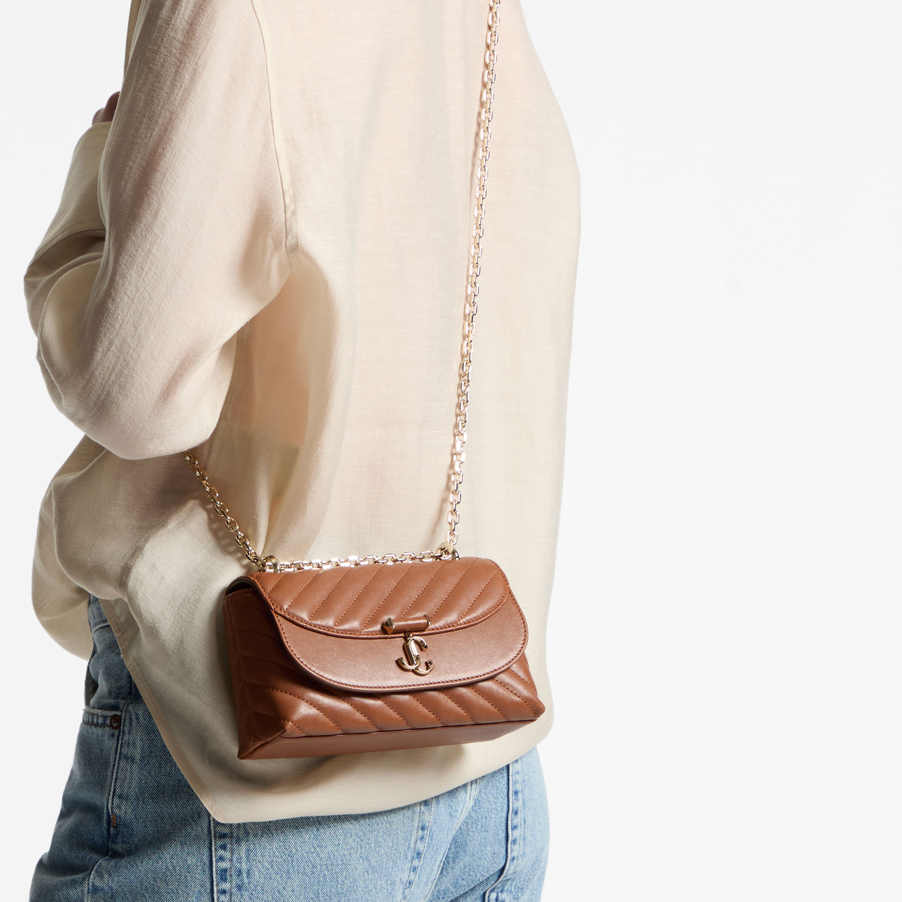 Avenue Curve Crossbody Small | Tan Quilted Biker Leather Crossbody