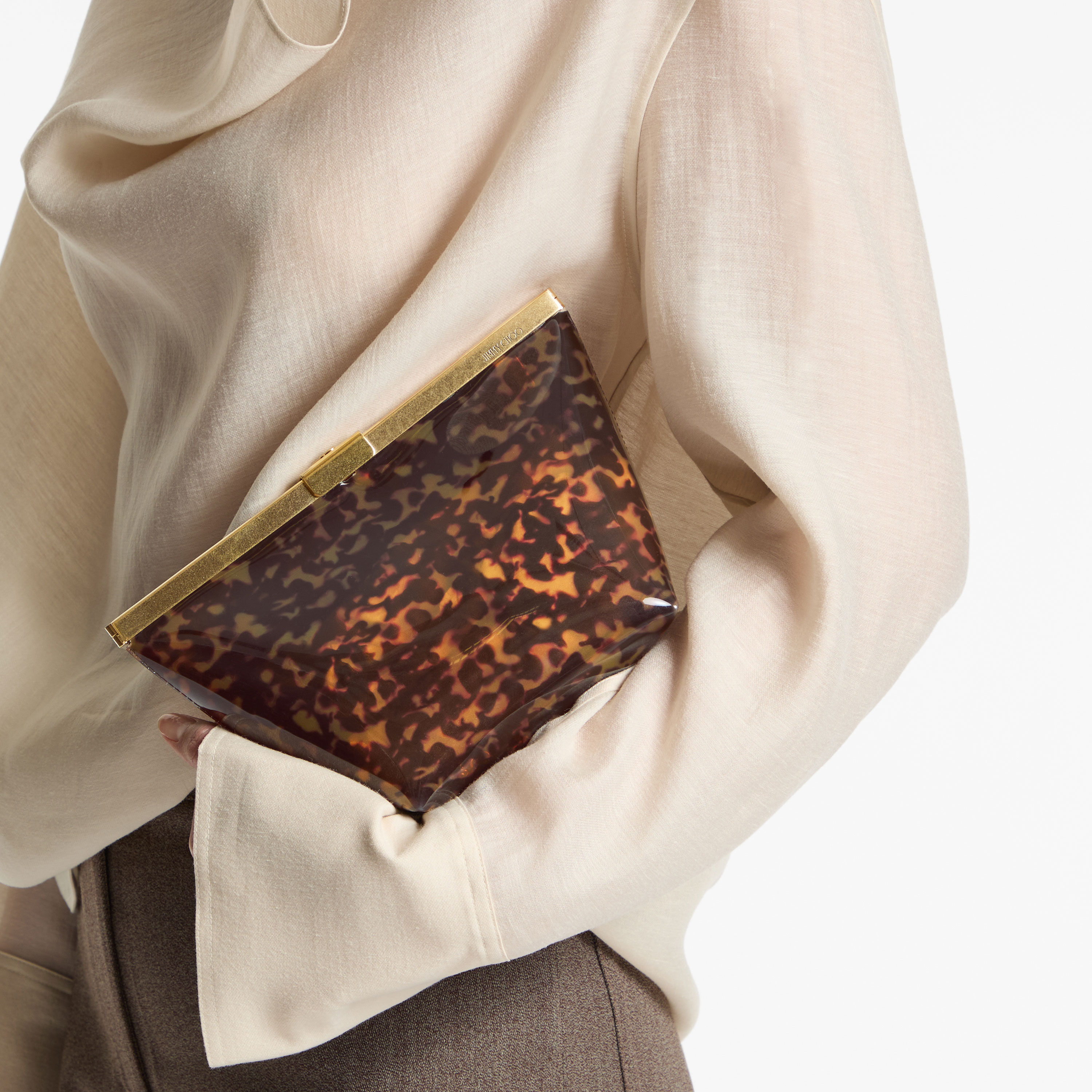 Ganache | Transparent Tortoisehell Clutch Bag | JIMMY CHOO