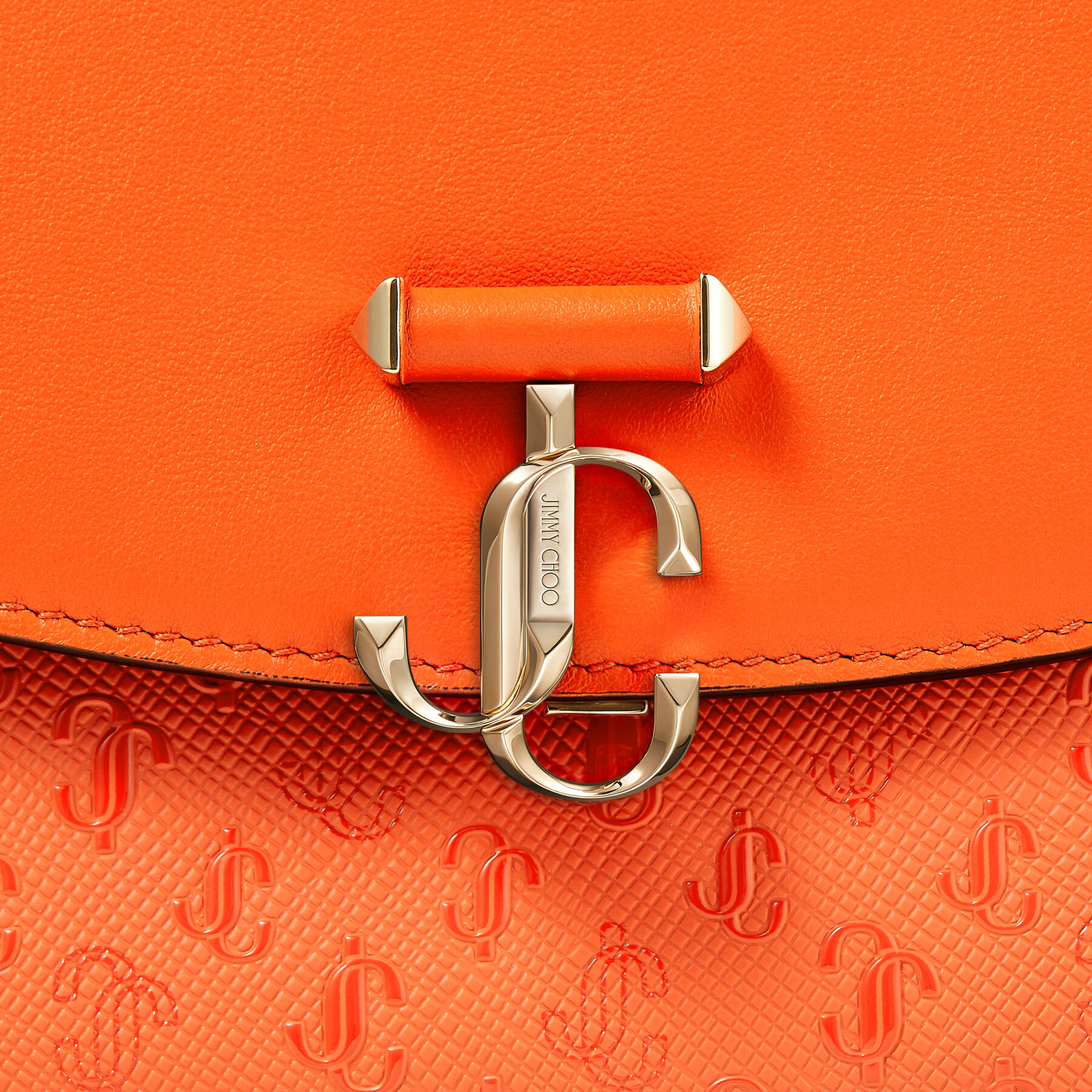 Amber Orange Grainy Leather Pouch with JC Emblem | JC ENVELOPE 