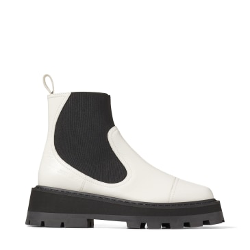 white boots black sole
