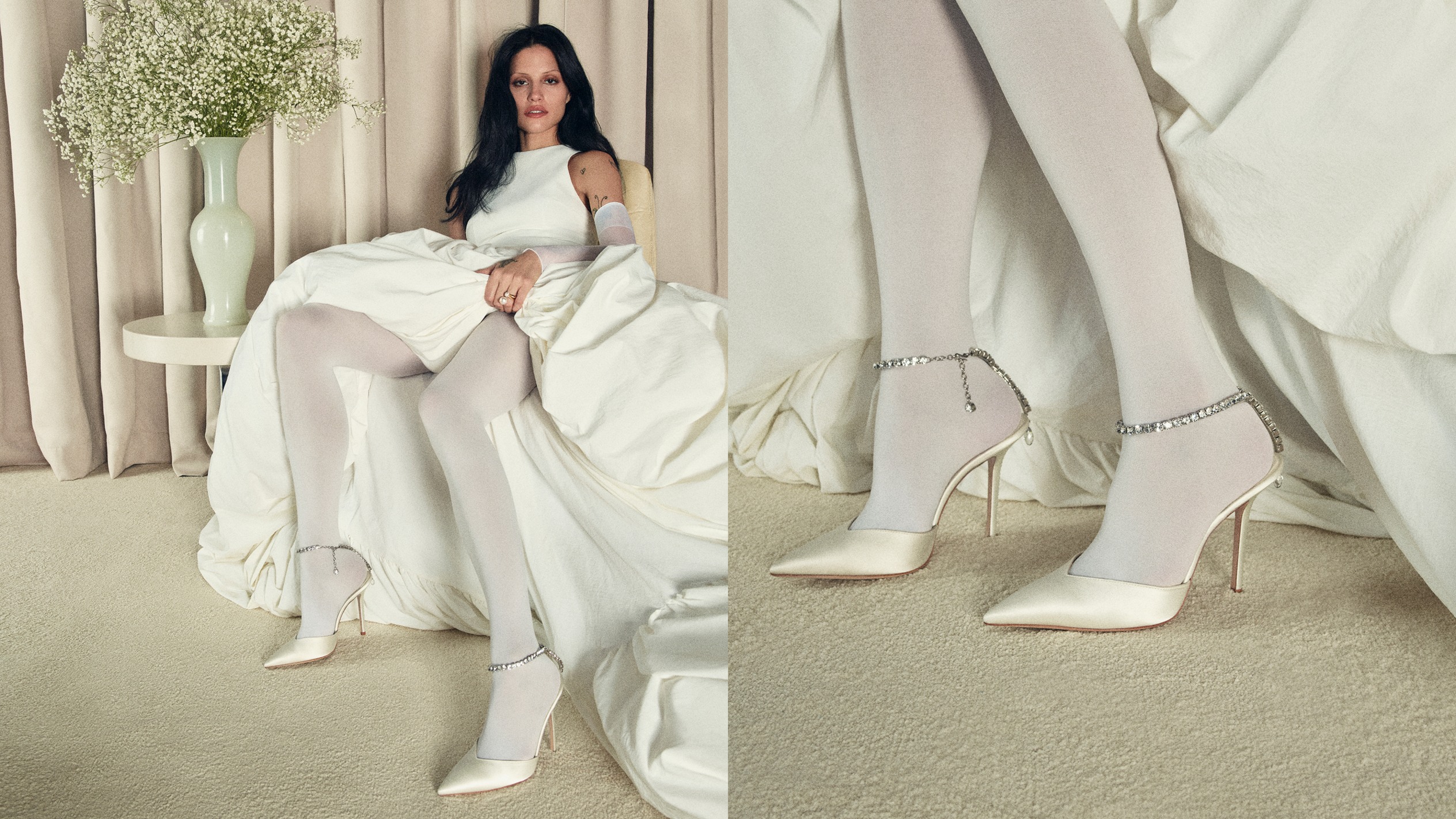 Model seated in ivory dress wearing pointed-toe heels with crystal ankle strap./ Ivory pointed-toe heels with crystal ankle strap detail.