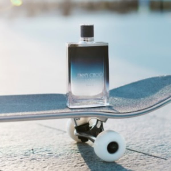 Jimmy Choo men&rsquo;s blue fragrance on skateboard
