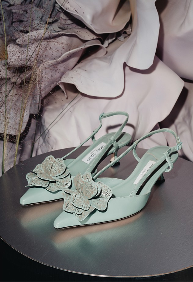 Collage of runway and detail shots from Jimmy Choo Spring 2026 at Milan Fashion Week, showcasing footwear, handbags, and guests in eveningwear.