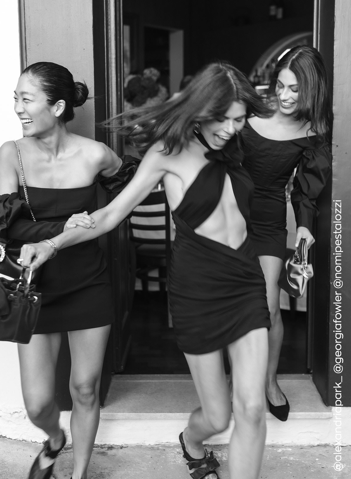 Jimmy Choo models style embellished heeled pumps and hold crystal-embellished mini bags