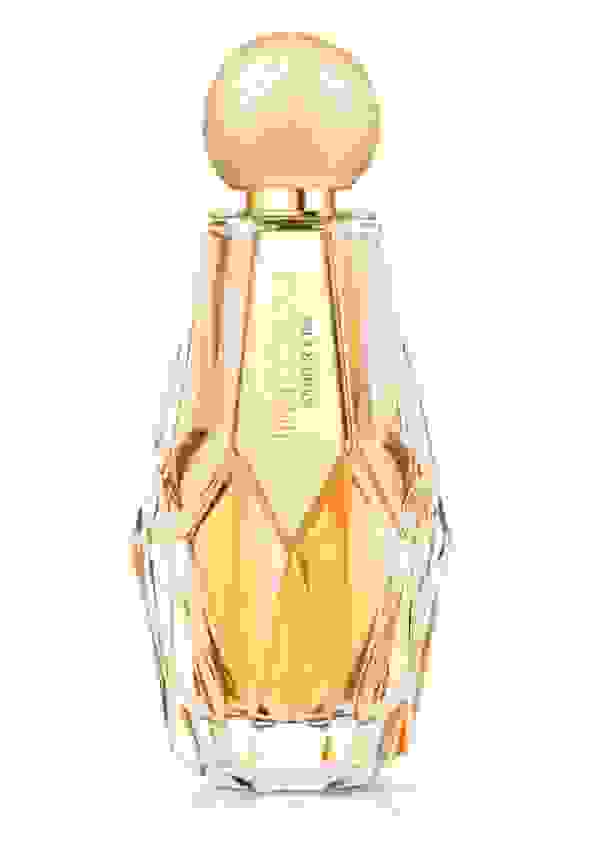 Jimmy Choo women’s fragrance Amber Kiss in multi-faceted glass bottle with gold glitter cap