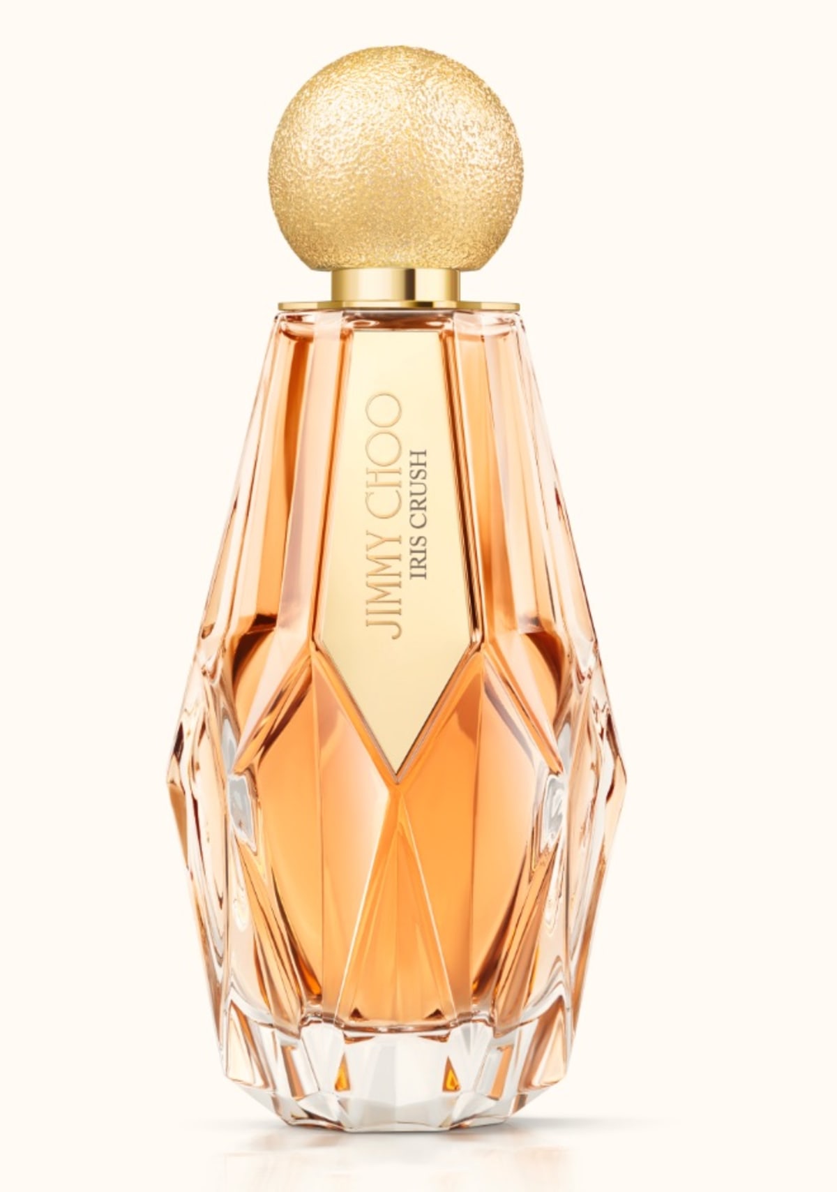 Jimmy Choo women&rsquo;s fragrance Iris Crush in multi-faceted glass bottle with gold glitter cap