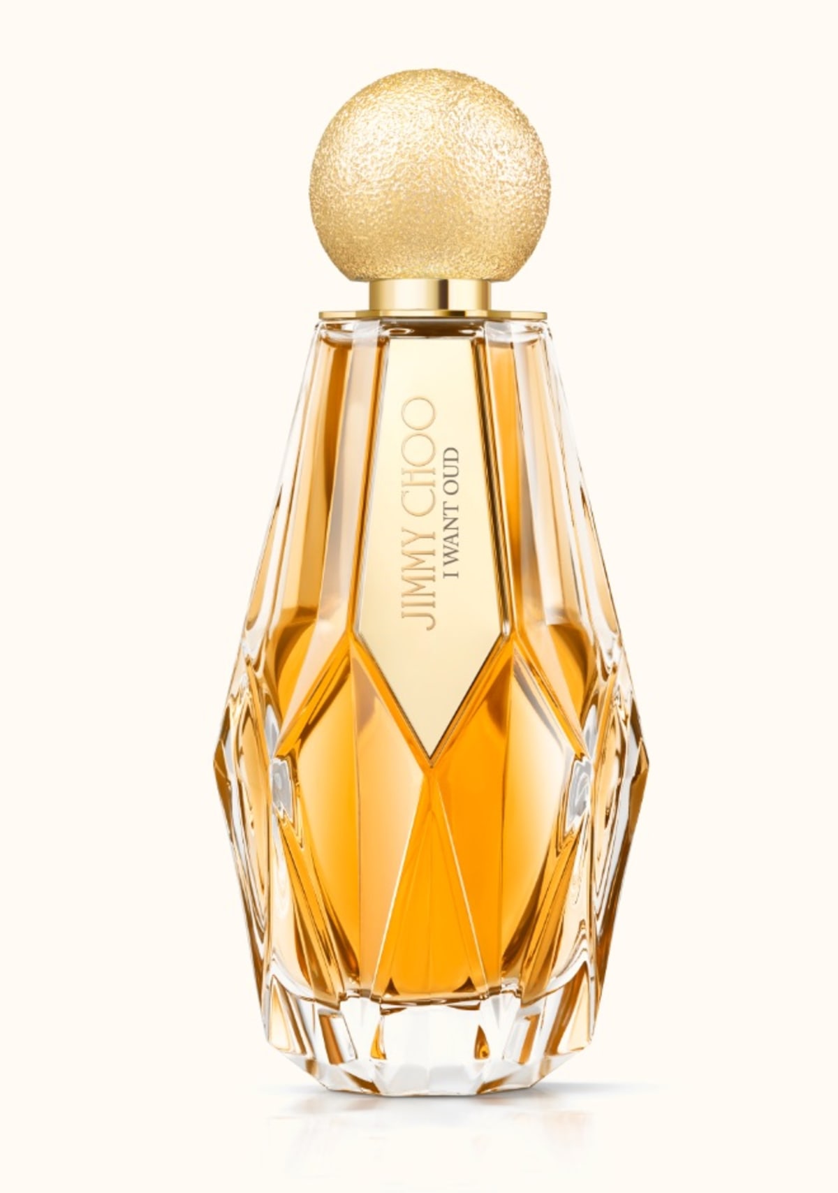 Jimmy Choo women&rsquo;s fragrance I Want Oud in multi-faceted glass bottle with gold glitter cap
