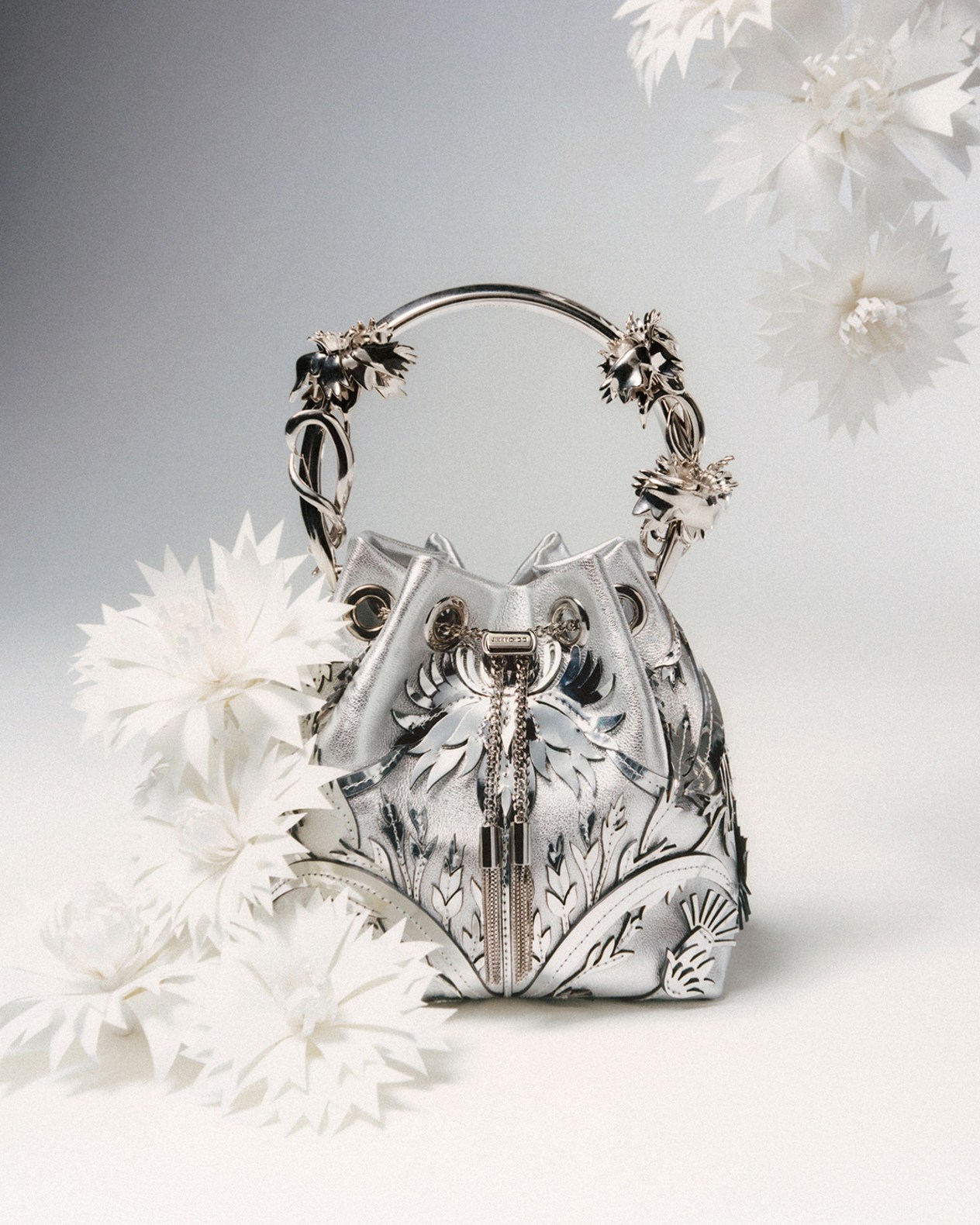  Crystal-embellished strappy heeled sandal with delicate ankle strap, styled beneath sheer tulle.