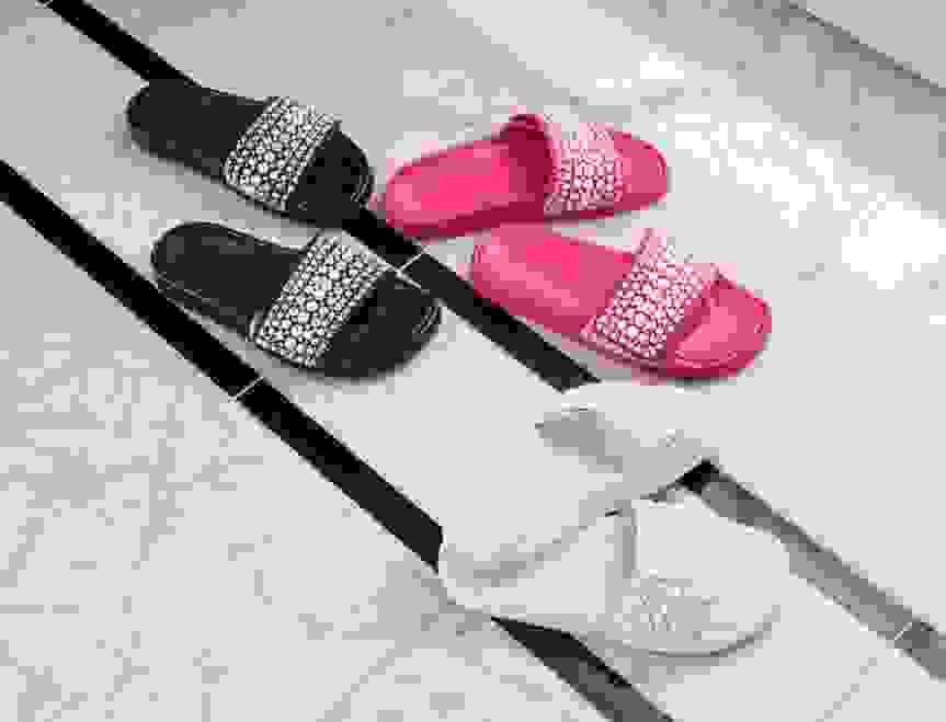 Jimmy Choo Slides in black, pink and white slides with pearl details 