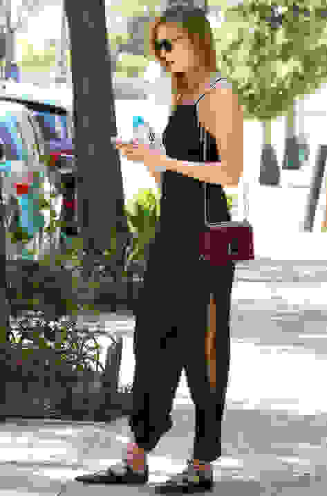 Karlie Kloss carrying LOCKETT PETITE