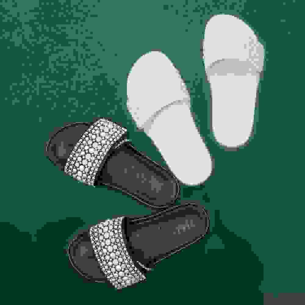 Jimmy Choo black and white slides with pearl details 