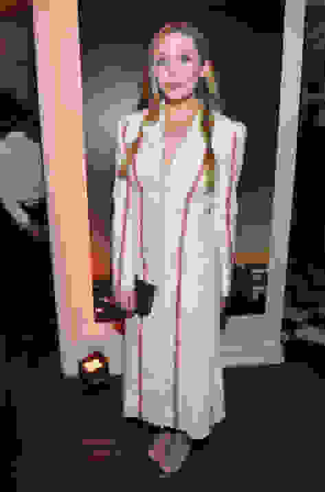 Elizabeth Olsen wearing LUCY and carrying CELESTE