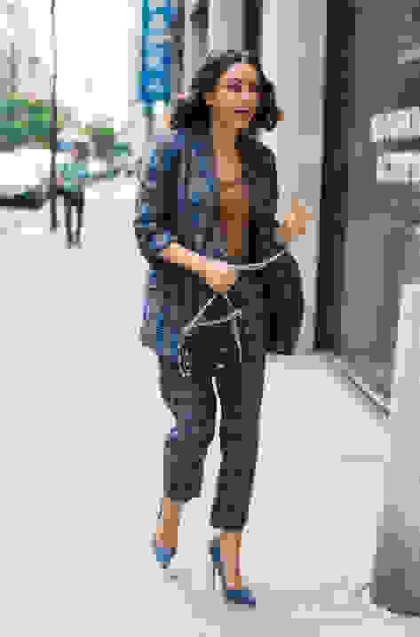 Mila Kunis wearing ANOUK and carrying LOCKETT