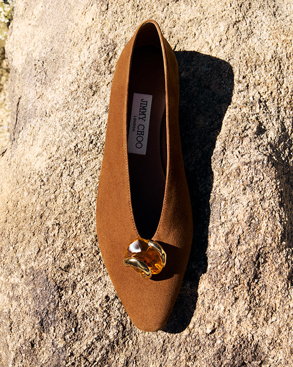 Jimmy Choo Tan Shoe on rock