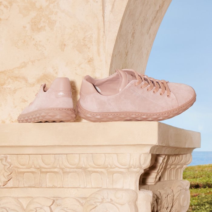 Jimmy Choo female model wearing Jimmy Choo Star Fringe Earrings with Swarovski crystals