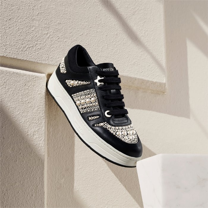 Jimmy Choo female model wearing Jimmy Choo Star Fringe Earrings with Swarovski crystals