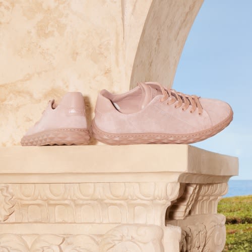 Jimmy Choo female model wearing Jimmy Choo Star Fringe Earrings with Swarovski crystals